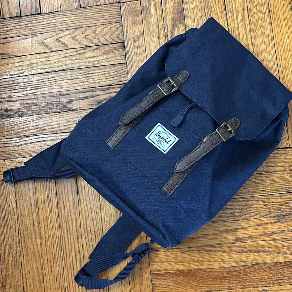 Herschel Supply Company, mini Navy backpack. Worn once. 5"D x 9"W x 11.5"H